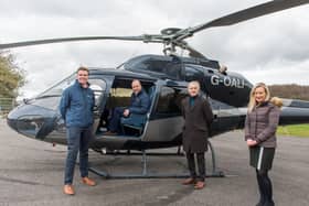 Jack Schofield and father Jason of The Helicopter Company, with James Towler and Emily Steed of McCormicks Solicitors, who advised on the acquisition. PHOTO: Kate Mallender.