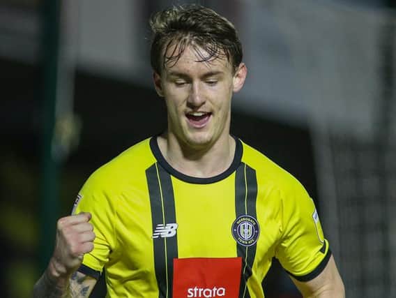 Will Smith celebrates after putting Harrogate Town 2-0 up against Colchester United. Pictures: Matt Kirkham