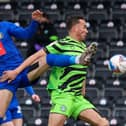 Dan Jones stretches for the ball during Harrogate Town's League Two loss at Forest Green Rovers. Pictures: Matt Kirkham