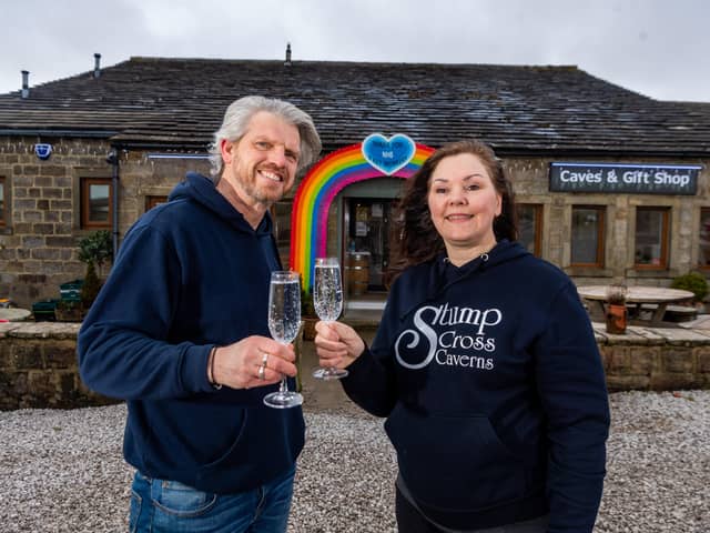 Lisa Bowerman, owner of Stumps Cross Caverns, with her partner Nick Markham, celebrating the news of reaching the fundraising target to keep the Pateley Bridge attraction open. Picture James Hardisty.