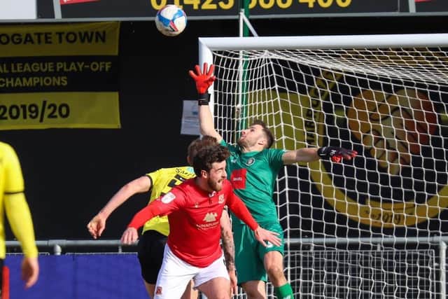 Goalkeeper James Belshaw was a busy man during the opening stages of Harrogate Town's defeat to Morecambe.