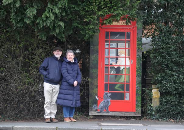 New artwork of a phone box by local artist Shirley Vine was unveiled at the corner King James Road and Aspin Lane, Knaresborough. The work was commissioned by Matt and Lynn Curl pictured. Picture Gerard Binks