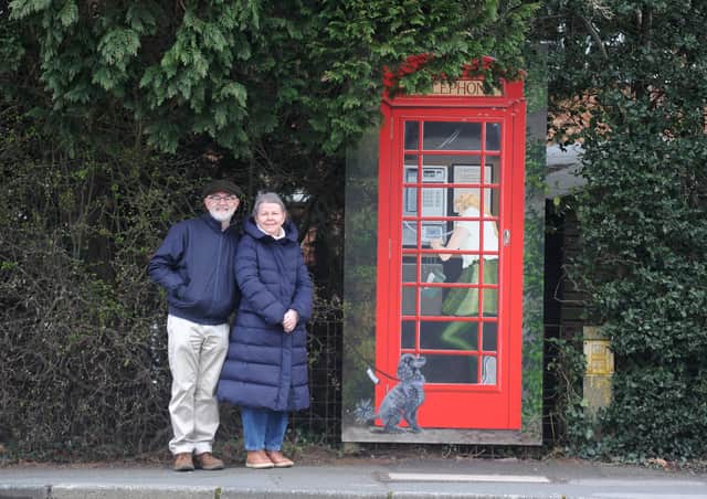 New artwork of a phone box by local artist Shirley Vine was unveiled at the corner King James Road and Aspin Lane, Knaresborough. The work was commissioned by Matt and Lynn Curl pictured. Picture Gerard Binks