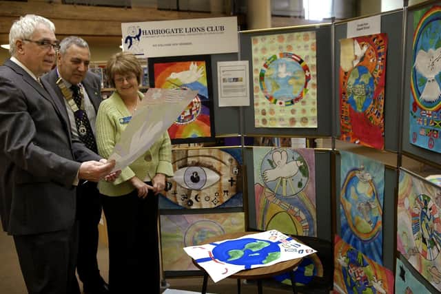 Left to right judging the International Peace Poster competition at Harrogate Library are Phil Willis MP, Harrogate Lions President Michael Williams and Harrogate Lions Activities Chairperson Dawn Ramshaw.