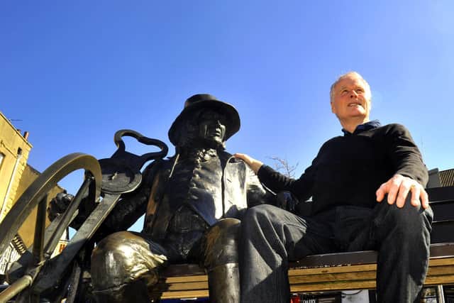 Historian Bernard Higgins with the Blind Jack statue in Knaresborough