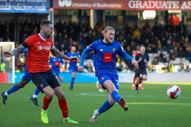 Luke Armstrong takes aim at the Luton Town goal during Sunday's FA Cup third round tie at Kenilworth Road.