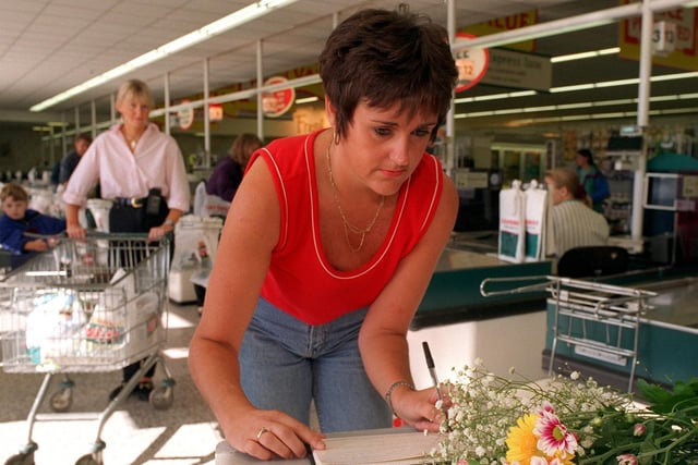 Jackie Allsop signs a book of condolence for Diana, Princess of Wales at Safeway's  in Garforth in September 1997.