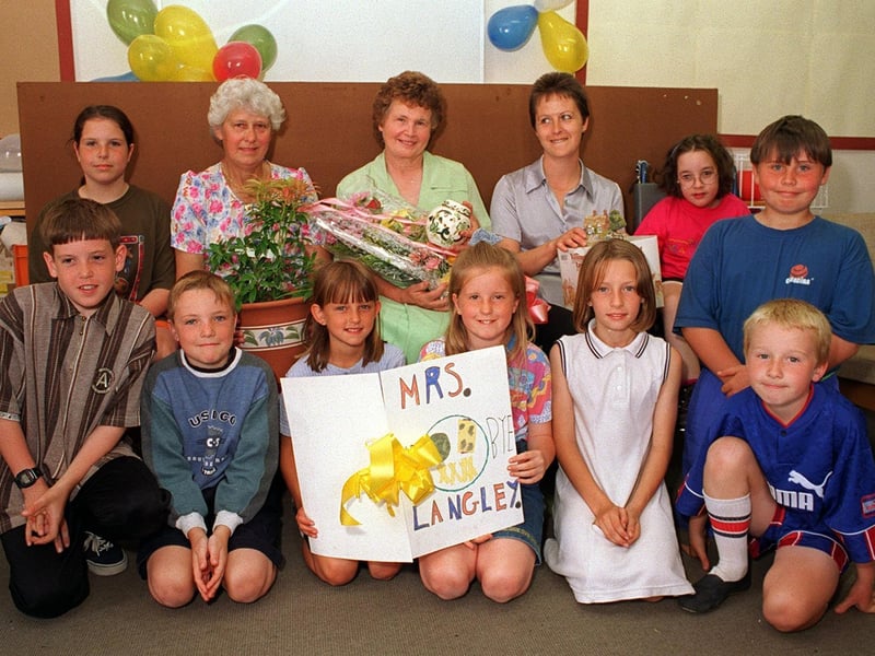 July 1997 and Dorothy Langley, pictured with flowers, was retiring from the kitchen at West Garforth Junior School after 20 years.