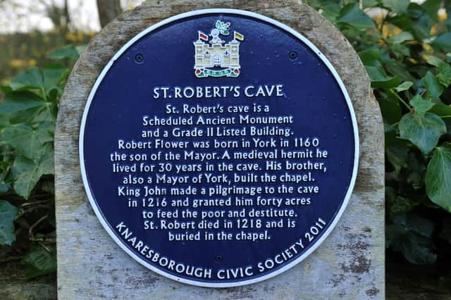 The  plaque at  St Robert's cave  in  Knaresborough .