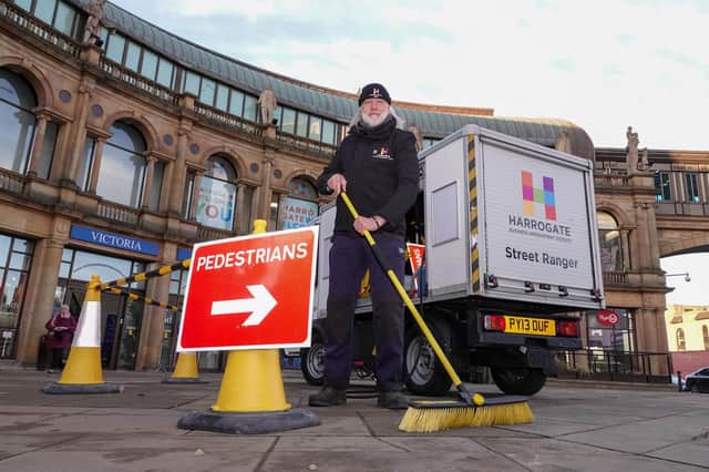 Grimebuster: Harrogate BID Street Ranger Chris Ashby will soon become a familiar figure in his electric vehicle carrying out cleaning and weeding duties in the town centre.