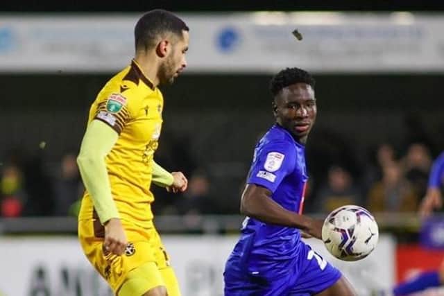Brahima Diarra keeps his eye on the ball during Harrogate Town's EFL Trophy quarter-final defeat to Sutton United. Picture: Matt Kirkham