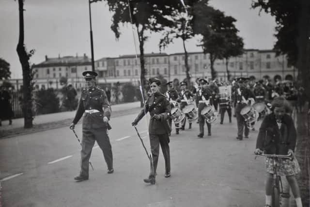 Early days - The young John Rushton, pictured centre in a military parade in the run-up to Second World War.