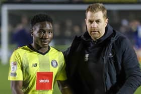 Simon Weaver, right, encourages Brahima Diarra to go and take the applause of the Harrogate Town supporters following his impressive display against Mansfield Town. Picture: Matt Kirkham