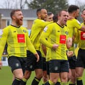 Harrogate Town's players celebrate at Wetherby Road. Pictures: Matt Kirkham