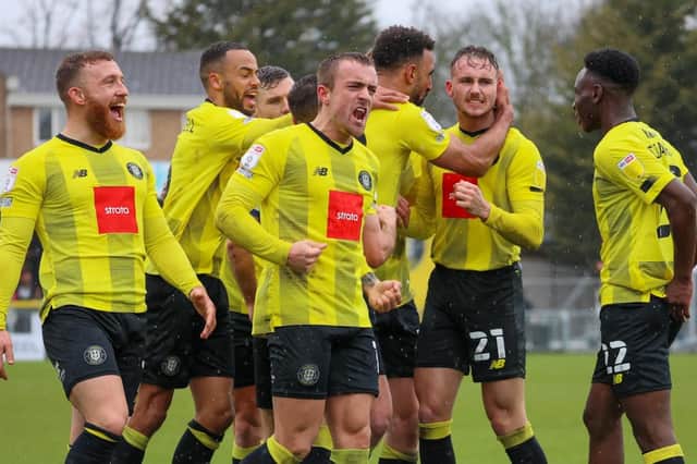 Harrogate Town's players celebrate at Wetherby Road. Pictures: Matt Kirkham