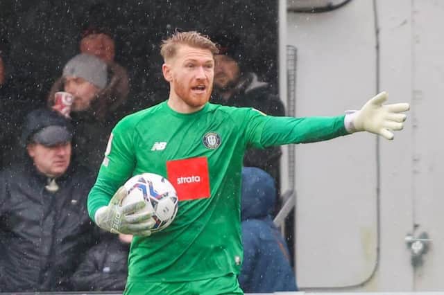 Mark Oxley shone between the stick as Harrogate Town beat Bradford City 2-0 on a wet, blustery afternoon at Wetherby Road. Pictures: Matt Kirkham
