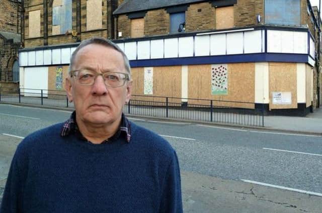 Liberal Democrat councillor Philip Broadbank pictured outside the former McColl’s store on Starbeck High Street.