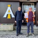 Mick Fryatt (centre) picked up an award for 25 years of service at Masham-based animal feed manufacturer I'Anson Brothers from directors Chris I'Anson and Sarah Richardson.