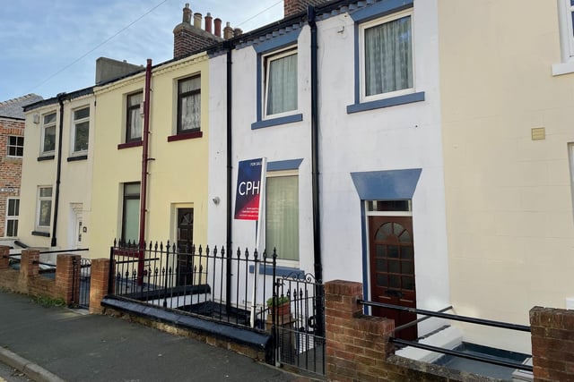 This two to three bedroom terrace set over three floors, is in the Old Town, and has panoramic sea views. it also has a garden and garage. For sale with CPH Property Services. Scarborough.