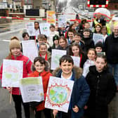 Starbeck Primary School pupils and Starbeck Residents Association demonstration at the level crossing in Starbeck. (Picture Gerard Binks)
