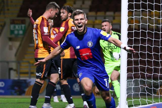 Lloyd Kerry celebrates after netting the only goal of the game during last season's clash between Bradford City and Harrogate Town at Valley Parade. Picture: Matt Kirkham