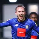 Jack Diamond celebrates after putting Harrogate Town 3-1 up against Bradford City at Valley Parade. Pictures: Matt Kirkham