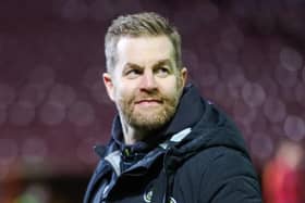 Simon Weaver is all-smiles in front of the away end following Harrogate Town's League Two win at Bradford City. Pictures: Matt Kirkham