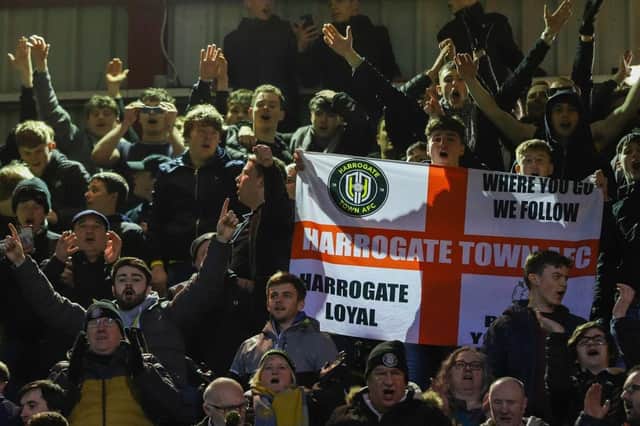 Harrogate Town fans cheer on their team at Valley Parade, home of Bradford City. Pictures: Matt Kirkham