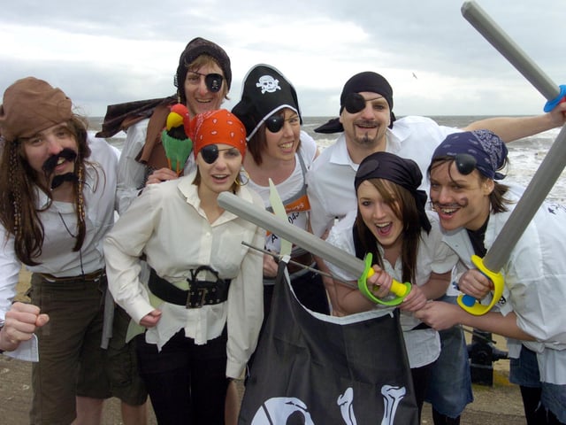 Ahoy there! Taking the pirate's approach to their Sport Relief Mile run are, from left, Tony Shaw, Richard Nichol, Rebecca Shaw, Kirsty Cockell, Katie Wright, James Dickinson and Hannah Howe.