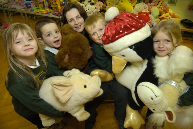 Pictured at the toy, book and cake sale at Barrowcliff Infants School are Hazel Senior from the Friends of Barrowcliff School, back, with youngsters, from left, Jasmine Myers, Ryan Thompson, Luke Trotter and Olivia Stockell.