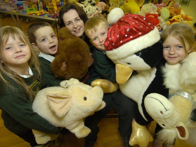 Pictured at the toy, book and cake sale at Barrowcliff Infants School are Hazel Senior from the Friends of Barrowcliff School, back, with youngsters, from left, Jasmine Myers, Ryan Thompson, Luke Trotter and Olivia Stockell.