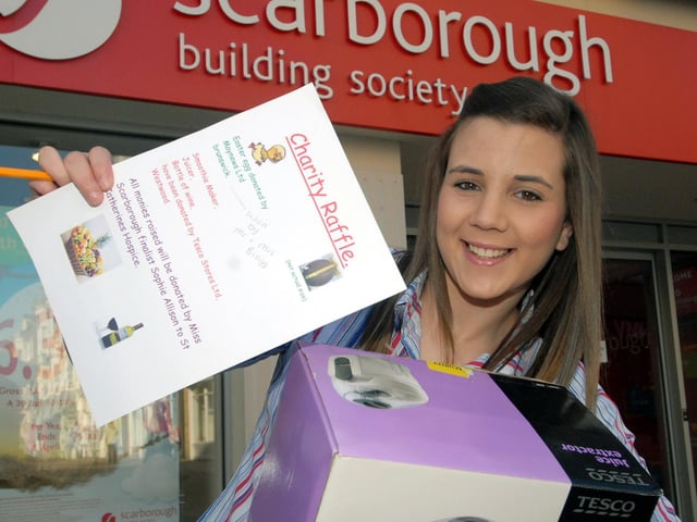 Scarborough Building Society's Sophie Allison, who is also a Miss Scarborough finalist, promotes a fundraising raffle.
