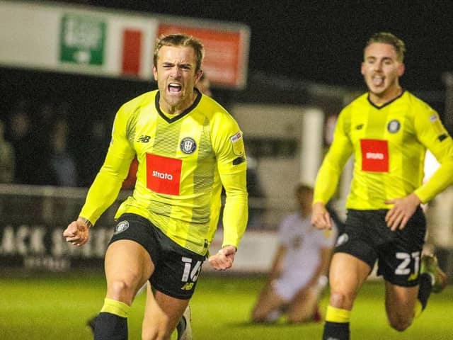 Alex Pattison celebrates after firing Harrogate Town into a first-half lead against Port Vale. Picture: Matthew Appleby