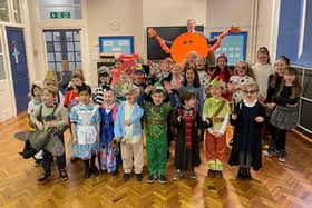 Children of St Peter's Church of England Primary School with Headteacher Mr Griffiths