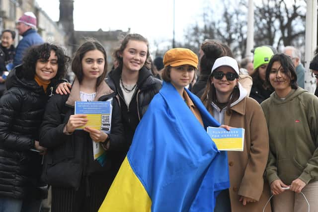 Young organisers of the Ukraine march on Saturday in front of Harrogate's war memorial. (Picture Gered Binks)