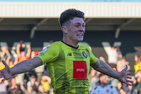Calum Kavanagh celebrates after netting a 94th-minute equaliser to earn Harrogate Town a 1-1 draw at home to Walsall. Pictures: Matt Kirkham