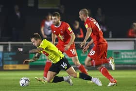 Harrogate Town midfielder Alex Pattison hits the deck during Tuesday night's 3-0 League Two loss to Leyton Orient. Pictures: Matt Kirkham