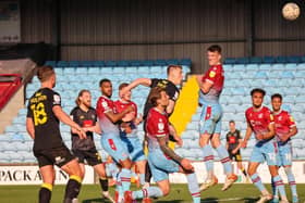 Will Smith heads home George Thomson's corner to put Harrogate Town 3-0 up at Scunthorpe United. Pictures: Matt Kirkham