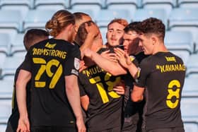 Harrogate Town celebrate after Jack Diamond fired them into a 2-0 lead against Scunthorpe United. Picture: Matt Kirkham