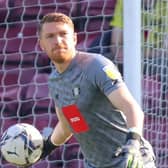 Harrogate Town goalkeeper Mark Oxley in action against Scunthorpe United at Glanford Park. Pictures: Matt Kirkham