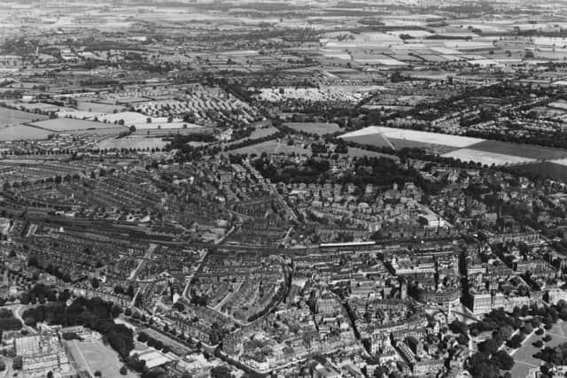 This image of Harrogate town centre in 1949 takes us from the Royal Pump House right out to the green fields which surrounded the town at the time
