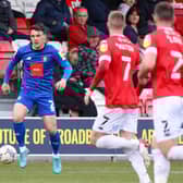 Ryan Fallowfield in action during Harrogate Town's League Two defeat at Salford City. Pictures: Matt Kirkham