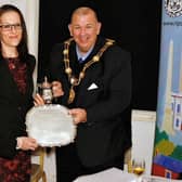 Grantley Hall owner, Valeria Sykes, and Senior Architect Anita, Rebaudo of Bowman Riley accepting the Hazzard Cup and the Helen Whitehead Salver from Ripon Mayor, Councillor Eamon Parkin.