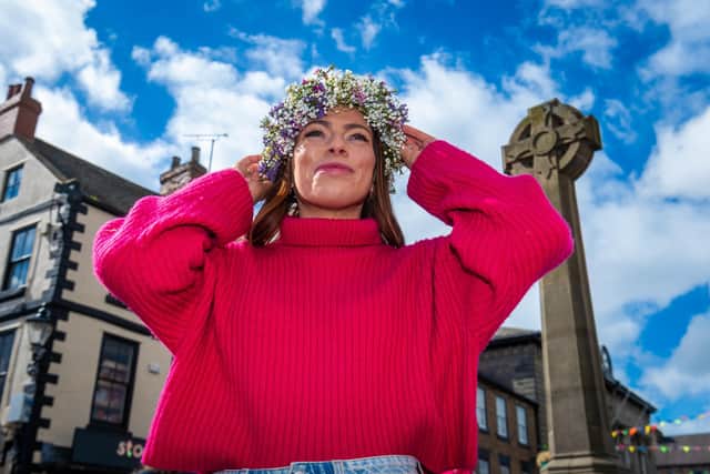 Rachel Allan, trainee florists wearing a flower crown, made during a workshop run by Ruebury Flowers in Knaresborough Market Place.
