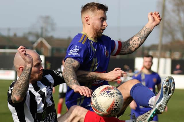 Harrogate Railway skipper Dan McDaid in action during his side's 2-1 NCEL Division One play-off semi-final success at Brigg Town. Pictures: Craig Dinsdale