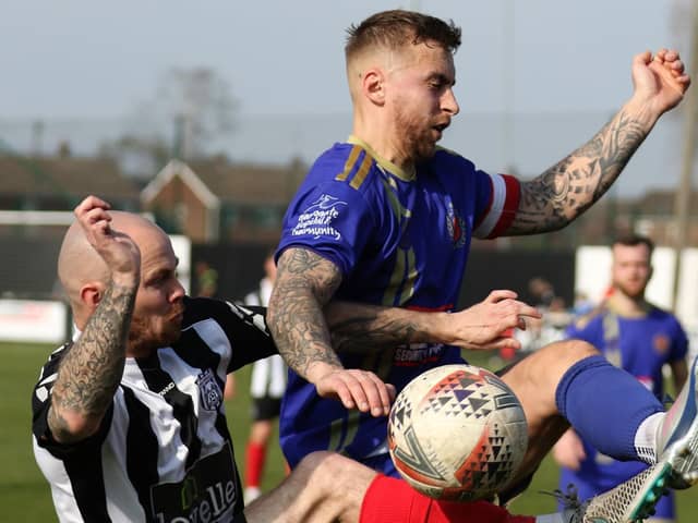 Harrogate Railway skipper Dan McDaid in action during his side's 2-1 NCEL Division One play-off semi-final success at Brigg Town. Pictures: Craig Dinsdale