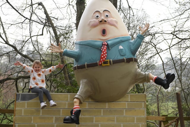 Five-year-old Hallie Dean pictured with Humpty Dumpty at The Bunny Door Trail at Mother Shipton's Cave in Knaresborough