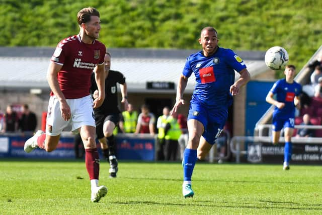 Aaron Martin on the run during Harrogate Town's Easter Monday defeat at Northampton Town.