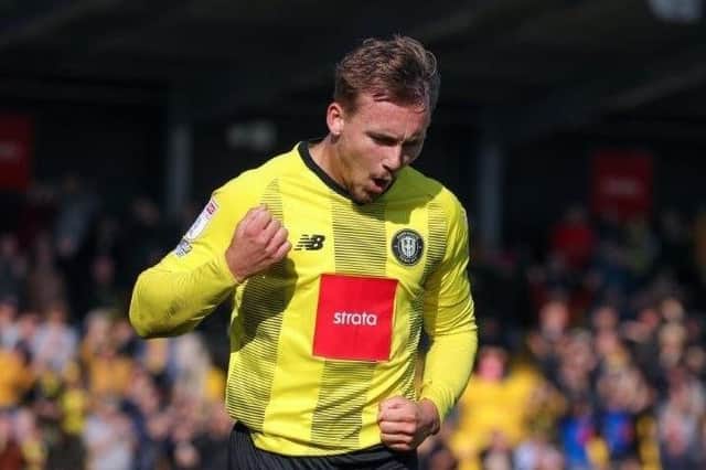 Jack Diamond celebrates after putting Harrogate Town 3-0 up against Carlisle United in stoppage-time. Picture: Matthew Appleby