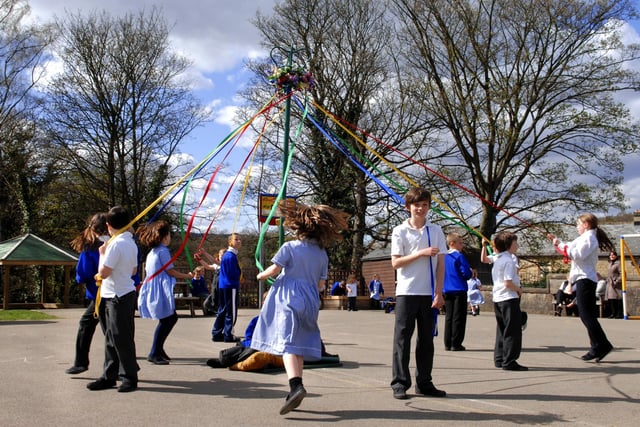 Pupils from Summerbridge Primary School practice around the Maypole ready for their May Day Fete.